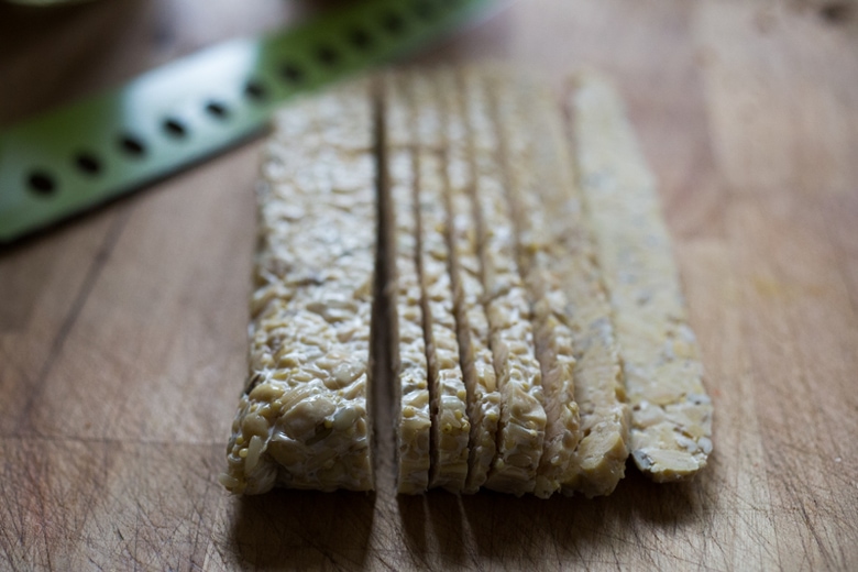 slicing tempeh.