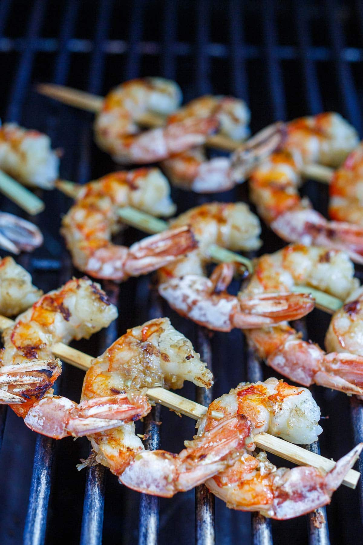 lemongrass shrimp skewers on grill.